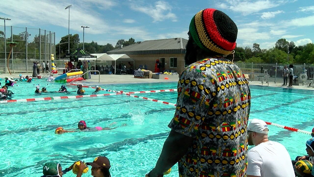 Water polo player teaches kids from African Communities how to swim